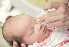 Keep your baby's face away from the pouring water and make sure to use warm, not hot, water. How To Clean Baby S Face Properly