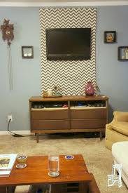 All you'll need is a screwdriver. Remodelaholic 95 Ways To Hide Or Decorate Around The Tv Electronics And Cords