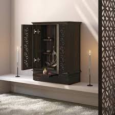 A pooja mandir in a home is the area set aside for an altar and worship of a god or several gods in the hindu pantheon. Pooja Mandir Upto 20 Off On Pooja Stands Pooja Shelves Online Urban Ladder
