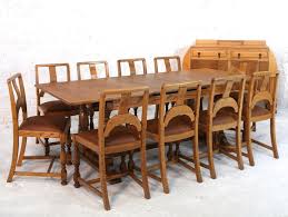 4.5 out of 5 stars. English Art Deco Oak 12 Piece Dining Suite Of Table Chairs And Sideboard For Sale At 1stdibs