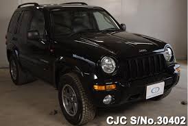 Image result for Brilliant Black 2004 Jeep