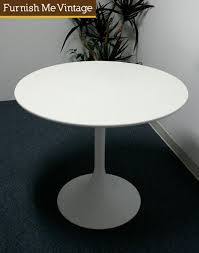 We have finished them with linseed oil. Mid Century Modern Bistro Size Retro Tulip Table