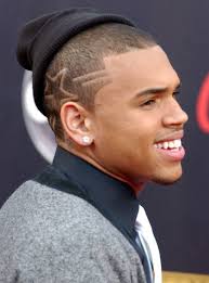 Black men haircuts like this always attract people with their height, volume, and unusual shape. Black Men Haircuts With Designs Fashion Belief