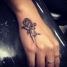 Black Rose And Buds On Hand Tattoo Hand Tattoos Tattoos For Women Classy Tattoos For Women