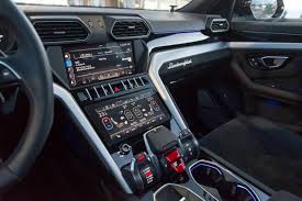 The 2021 lamborghini urus is extreme in almost every way, which is exactly what's expected when interior cubby storage is highlighted by useful door pockets and a bin behind the floating center stack. Lamborghini Suv Interior Review Worth 200k Tractionlife