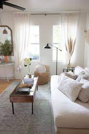 5 Rental Friendly Decorating Tricks To Make Your Whole Home Look Bigger Rental Home Decor Home Living Room Setup