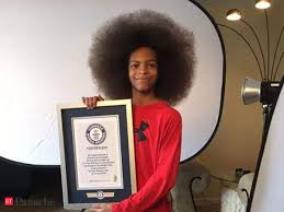 However, if you do enough research short hair in front is a wonderful way to direct the attention to the long hair in the back. Guinness World Record 13 Year Old Boy With World S Largest Afro Measuring 25 4 Cms The Economic Times