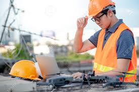 asian engineer man working with drone remote control and laptop stock photo picture and royalty free image image 117633572 asian engineer man working with drone remote control and laptop