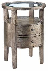 In addition to style, a nice pair of end tables can add extra storage space or act as a spot to showcase lighting and décor. Stein World Accent Tables Round Accent Table W Glass Insert Top Pedigo Furniture End Tables