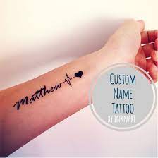 Baby name tattoos mommy tattoos tattoos with kids names mother tattoos tattoos for daughters little tattoos couple tattoos mini. 17 Best Daughters Name Tattoo Ideas Name Tattoo Baby Tattoos Baby Name Tattoos