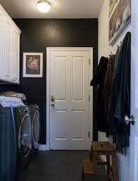 Try something brighter or darker than you'd usually go for, and you may be surprised how much you love your new diy laundry room. Check Out This Dramatic Transformation For A Mud Room Laundry Room Benjamin Moore Ony Laundry Room Color Schemes Laundry Room Paint Color Black Paint Color