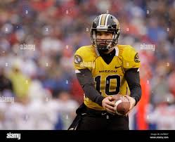 Missouri quarterback Chase Daniel hands off the ball during the third  quarter of a NCAA college football game against Kansas Saturday, Nov. 29,  2008 in Kansas City, Mo. Kansas won the game