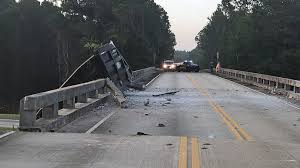 Unmarked road work sends car flying into the night. I 16 Shut Down Between Savannah Macon After Crash Causes Bridge To Shift 6 Feet