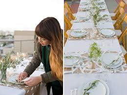 Loving the marble table and polka dot string lights. Rooftop Dinner Party