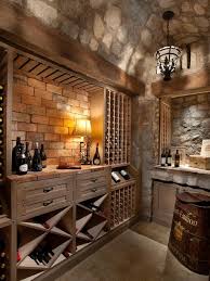 Our wine cellar ideas roundup showcases Stone Brick And Wood Combine To Create This Neutral Wine Cellar Filled With Rustic Charm A Metal Pendant Light Weinkeller Design Weinkellerdesign Weinkeller