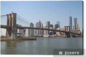 If landscapes delight you, then try out this cityscape. New York City Manhattan Downtown Skyline Brooklyn Bridge Canvas Print Pixers We Live To Change