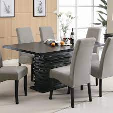 A contemporary dining room set is the perfect way to make meals feel less mundane. Stanton Contemporary Dining Table Coaster Furniture Furniturepick