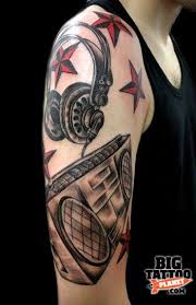 It is probably a nod to her band boomkat. Jo Pink Boombox Tattoo Big Tattoo Planet