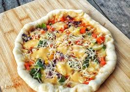 Campur aduk, gula perang, sawi kering dan pala pilihan, masak bersama sehingga kelancaran. Is Edam Vegetarian