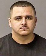 Stolen handgun seized from shoplifting suspect