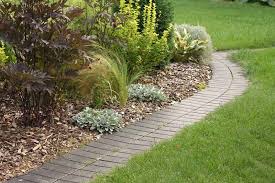 Smooth any rough edges with sandpaper. 15 Creative Ways To Use Bricks In Garden Design Gardener S Path