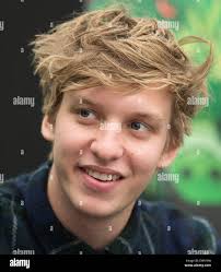 Scheessel, Germany. 20th June, 2015. British musician George Ezra smiles  during an interview with German news agency dpa at the Hurricane Festival  in Scheessel, Germany, 20 June 2015. Around 65,000 visitors are