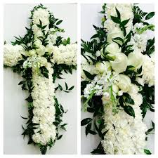 Sympathy flowers funeral wreaths mixed funeral flowers. Classic All White Sympathy Cross For Family Service So Beautiful Funeral Flower Arrangements Funeral Flowers Flower Arrangements