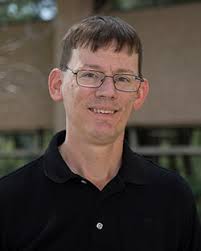 Improving Modeled Momentum Flux in the Atmospheric Boundary Layer