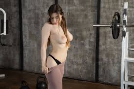 Ella Mira Sexy in Fishnet - Captivating Lingerie Pose