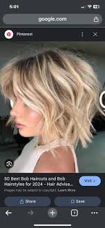 anyone know of anyone good who knows how to cut long hair in town??