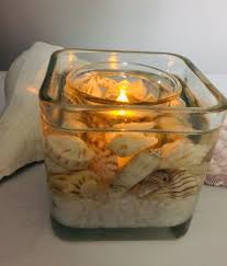 Create an unforgettably elegant yet simple centerpiece in the most economical way. Resin Seashell Tealight Candle Holder In 2020 Tealight Candle Holders Homemade Candle Holders Tealight Candle Holders Candle Holders Homemade Candle Holders