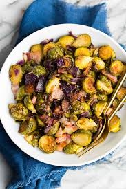 Wrap one sprout in bacon and hold together with toothpicks. Roasted Maple Bacon Brussels Sprouts A Saucy Kitchen
