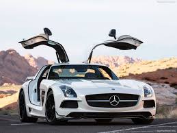 White Mercedes Sls With Gull Wing Doors Mercedes Benz Sls Mercedes Benz Sls Amg Mercedes Benz Amg