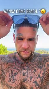 Sunny Beach Holiday with Tattoos and Sunglasses