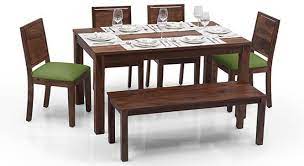 If you intend to shop for one that lasts for a decent more than that, to ensure the sturdiness of the dining table set with bench, its legs are made of a good quality of metal and finished with white coat. Arabia Oribi 6 Seater Dining Table Set With Bench Urban Ladder