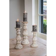 Includes lidded box, 2 candle holders, 2 photo frames (large and small) and 2 vases (large and small) made of silvertone metal, glass and crystal; Candle Holder Rustic 12x33cm Karimun Aged Stone Clanbay