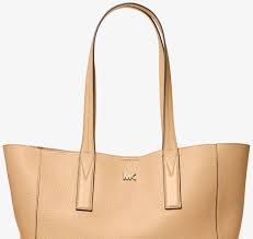 What kind of clothes does michael kors wear? How To Spot Fake Michael Kors Bags 9 Ways To Tell Real Purses