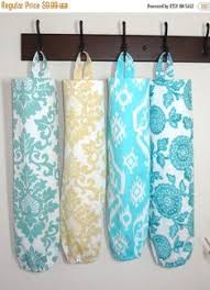 Find plastic grocery bag holder at socialscour.com! 68 Best Plastic Bag Organizer Ideas Plastic Bag Plastic Bag Holders Grocery Bag Storage