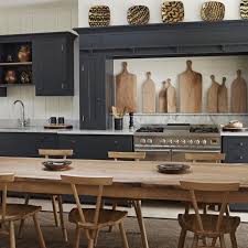 Dining Table Made From Rough Natural Wood Withsix Matching Chairs Dark Gray Cupboards And She In 2020 Large Wooden Dining Tables Rustic Kitchen Dining Table In Kitchen