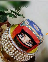 كيكه مزينه بصوره فتاه صنعانيه ترتدي اللثام والستاره الصنعانيه وهي مخصصه لحفله ليله الحناء yemen women henna party bridal shower cupcakes