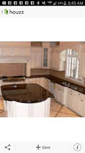 Tan Brown Granite Counters With White Cabinets And Peach Tan Floors Brown Granite Countertops Tan Brown Granite Kitchen Design Granite Countertops