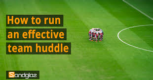 Why The Morning Huddle Is The Best Meeting You Ll Ever Have Sandglaz Blog Team Motivation Effective Meetings Huddle Board
