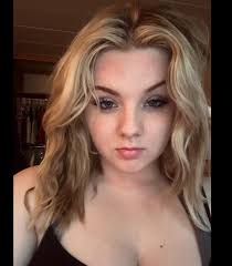 Up next is Ariel Albright. Ariel is a Freshman majoring in Family and  Children studies. On the team Ariel is a base. Ariel is new to cheer and  she joined the team