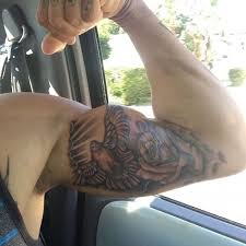 So roll up those sleeves, get your arm ready, and happy inking. Love Tattoo Bicep Novocom Top