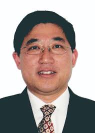 Improvement of Ga2O3 vertical Schottky barrier diode by constructing  NiO/Ga2O3 heterojunction