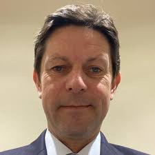 The Raising Canes founder is my new favorite billionaire: