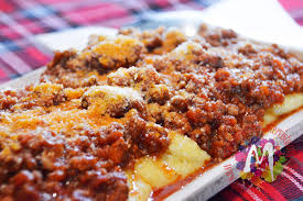 Scopri dosi e procedimento per preparare questa ricetta. Polenta Con Sugo Di Salsiccia Fresca E Funghi Porcini Calendario Del Cibo Italiano Monicucci Chef