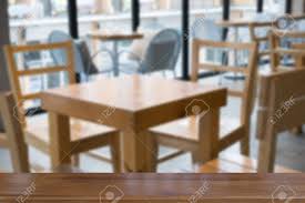 Coffee table features choose a coffee table that fits your style and your needs. Table And Chair In Food Court Cafe Coffee Shop Cafeteria Restaurant Interior With Wood Table For Montage Or Display Your Product Stock Photo Picture And Royalty Free Image Image 78161087