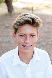 Anime boy with brown hair and green eyes and glasses. Portrait Of A Handsome Teen Boy With Brown Eyes And Braces Photograph By Cavan Images