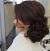 Curly Side Bun With Braid